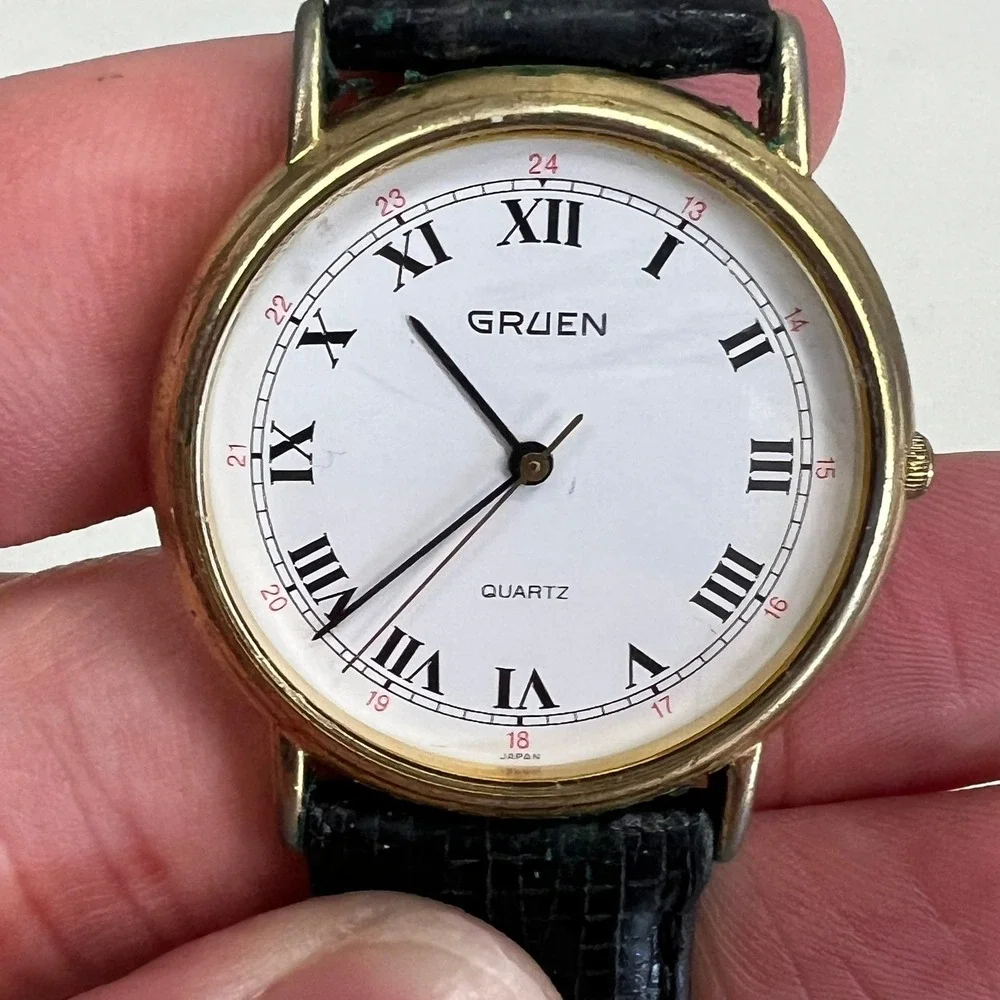 Gruen Mens Quartz Watch Gold Tone Roman Numeral White Dial Black Leather Strap